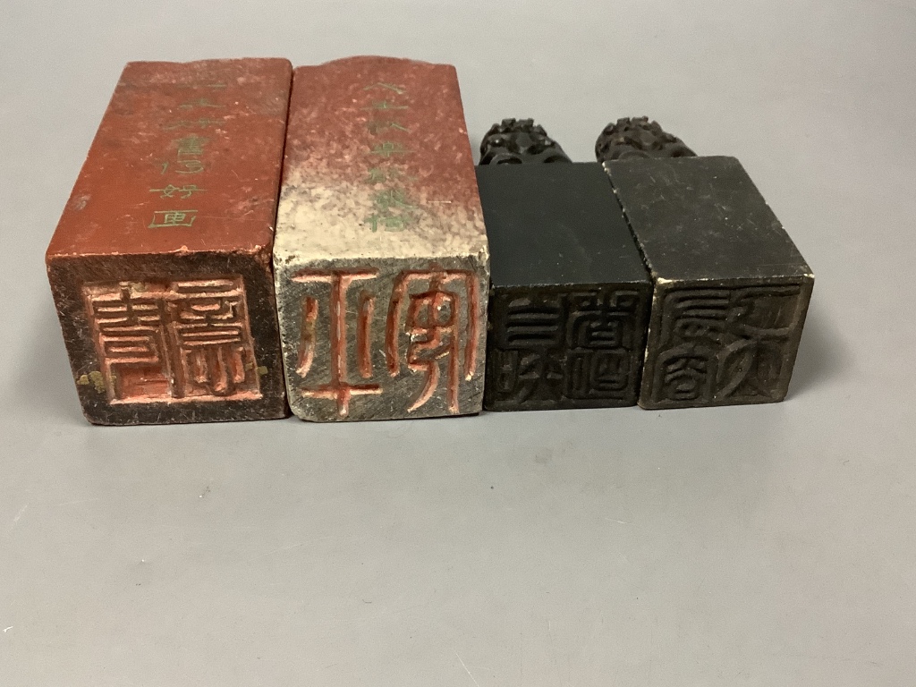 A pair of Chinese ‘chicken’s blood’ soapstone seals and eight other soapstone seals, tallest 13cm, Provenance: Henri Ely Thence to his son General Paul Ely